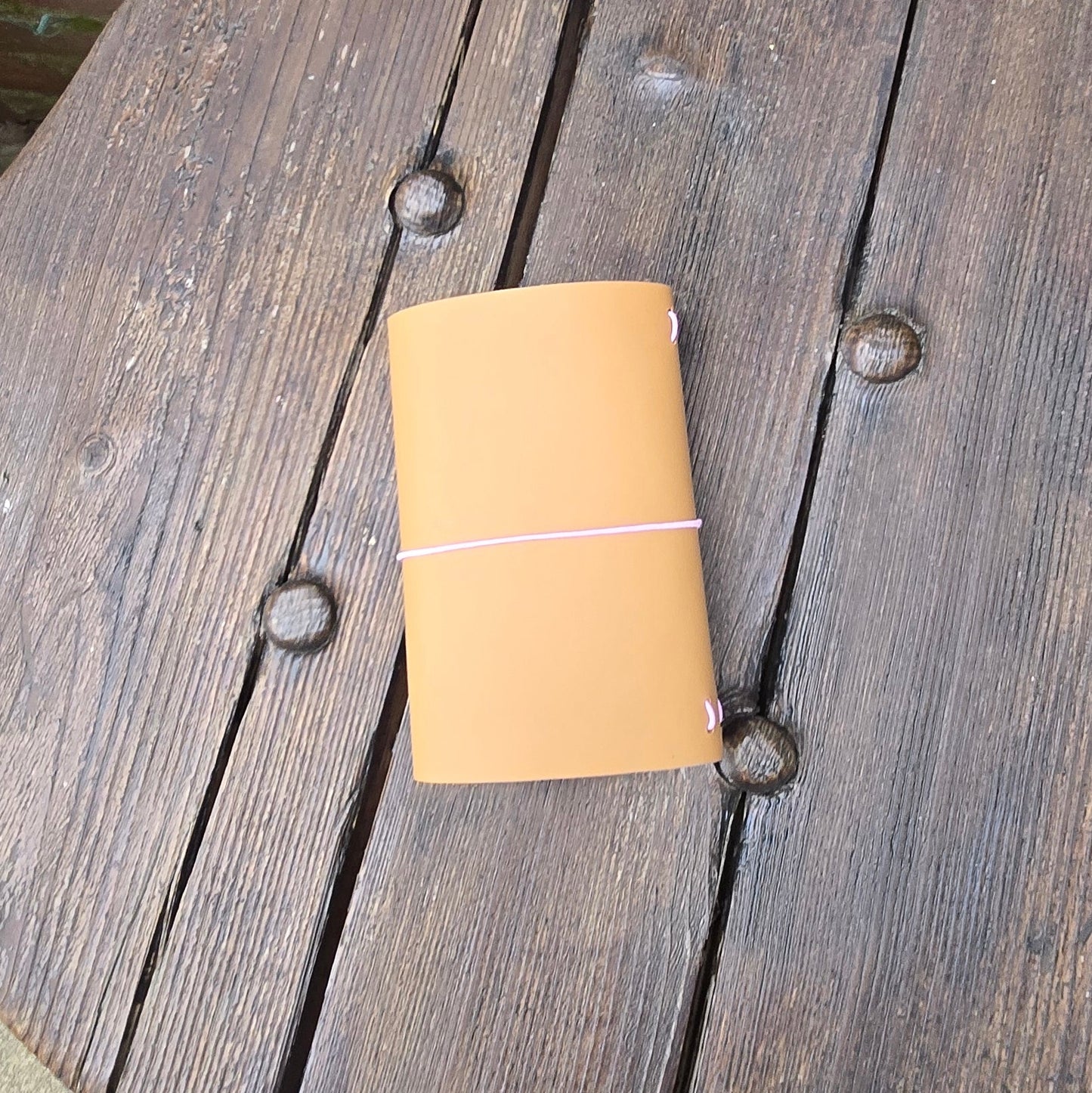 A. Leather Pocket Journal Cover.